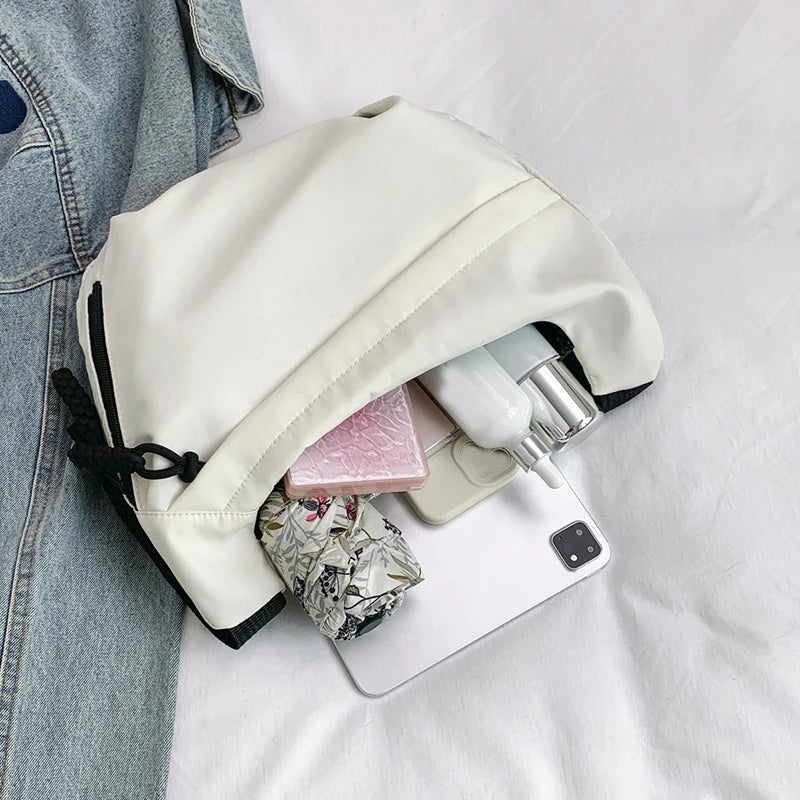 Neutral style tote bag with strap for carrying fitness items. New mini street-style handbag with shoulder strap. Lightweight and GONZALES ONLINE SHOP