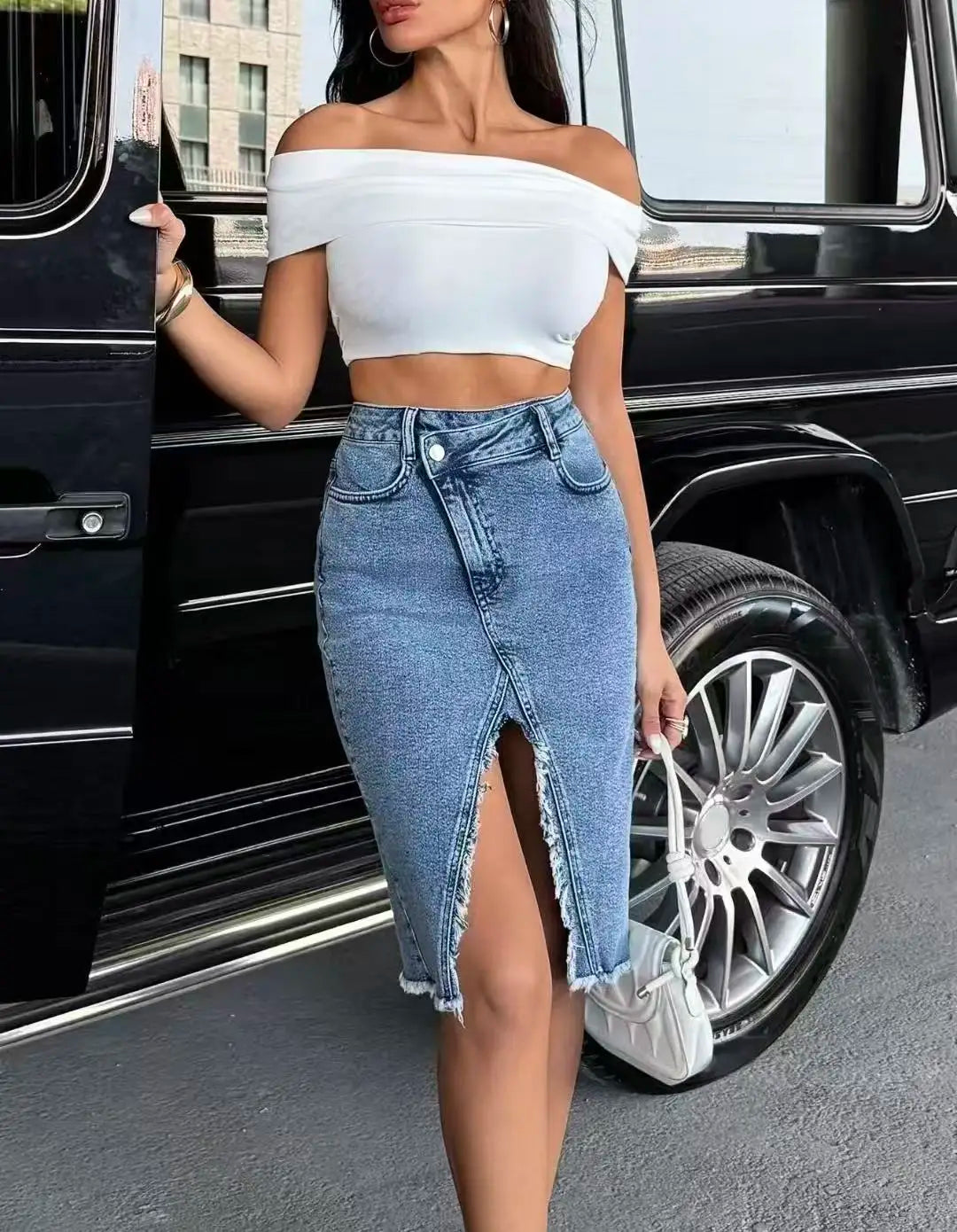 High-waisted denim skirt with side slit and raw-edge hem GONZALES ONLINE SHOP