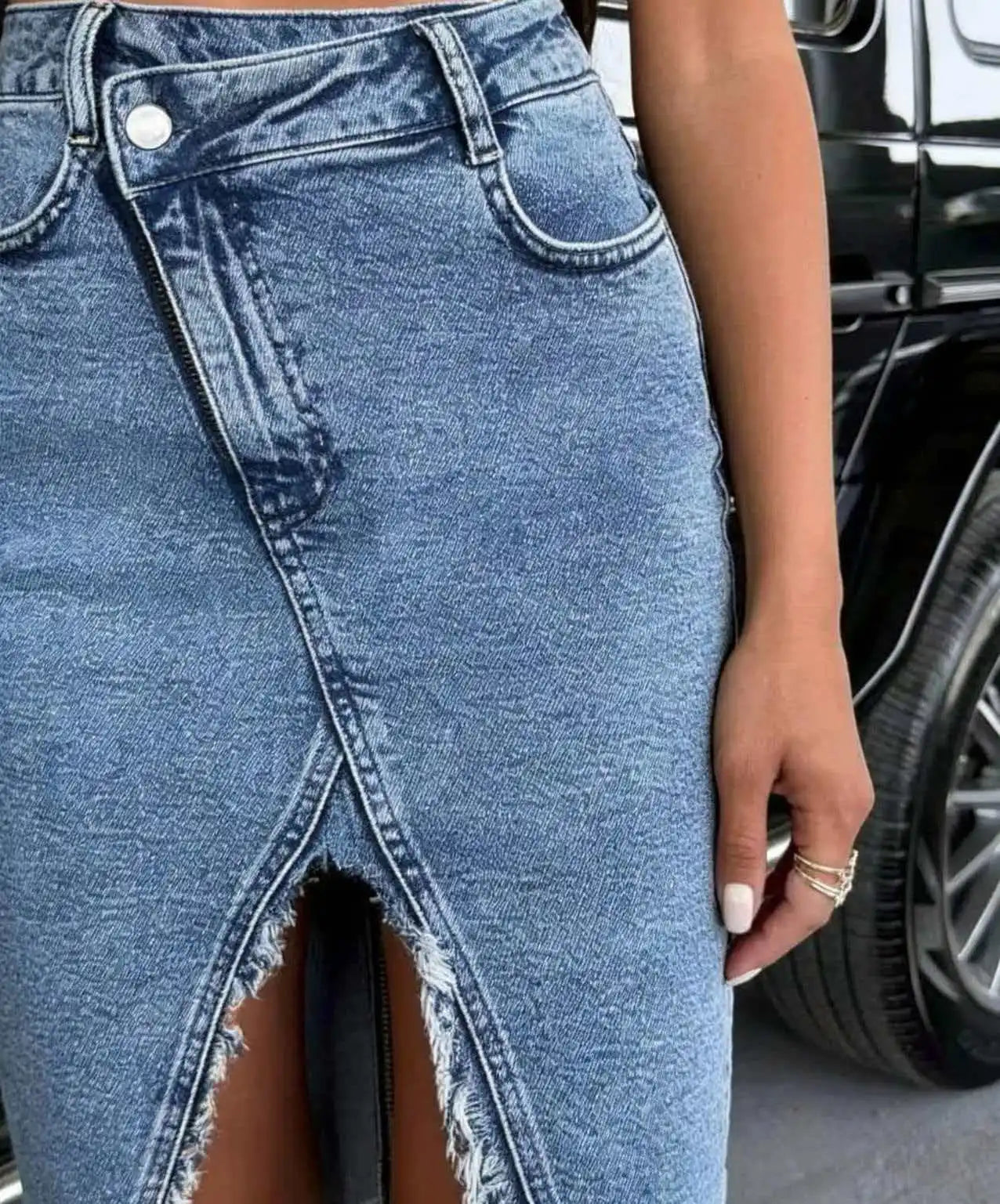 High-waisted denim skirt with side slit and raw-edge hem GONZALES ONLINE SHOP